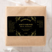 Zwarte en goud serumlabels etiket (Insitu)