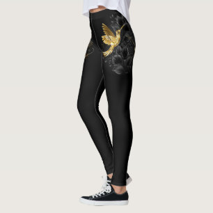 Zwarte en goudvogel leggings