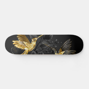 Zwarte en goudvogel skateboard