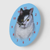 Zwarte en witte kat,  klok (Hoek)