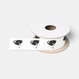 Zwarte en witte katten lint