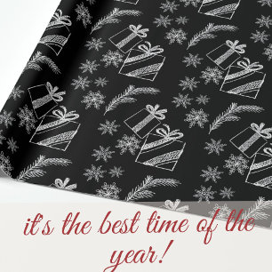Zwarte en witte kerstcadeautjes en sneeuw cadeaupapier