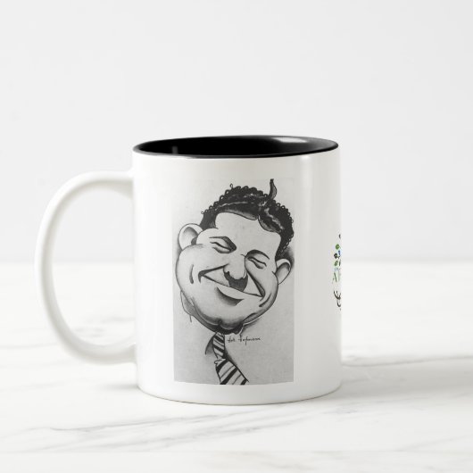 Zwarte en witte mok met karikatuur van Art Hofmann (Links)