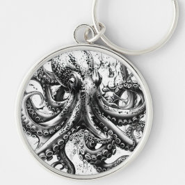 Zwarte en witte octopus lijkt op een eeuwenoude in sleutelhanger