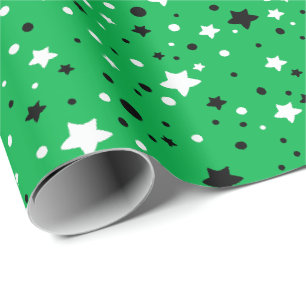 zwarte en witte sterren op groen cadeaupapier
