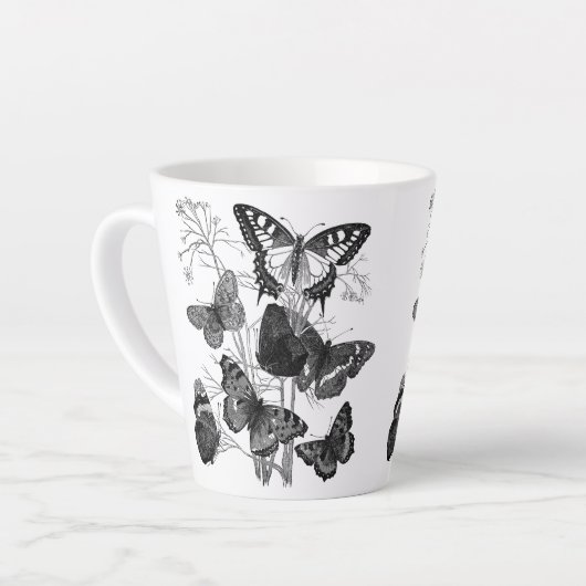 Zwarte en witte vlinders latte mok (Linkerhoek)