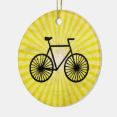 Zwarte fiets; gele achtergrond keramisch ornament (Links)