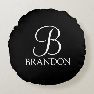Zwarte gepersonaliseerde script monogram en naam rond kussen