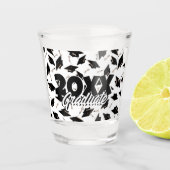 Zwarte gradatiekappen getoseerd in de lucht op wit shot glas (Voorkant)