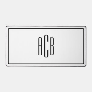 Zwarte grens drie letters blauw monogram bureaumat