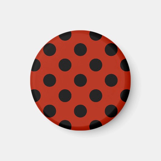 Zwarte haarpunten op rood magneet (Voorkant)