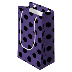 Zwarte haarpunten op ultraviolet klein cadeauzakje