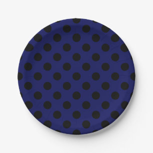 Zwarte haarstaartstippen op blauw papieren bordje