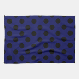 Zwarte haarstaartstippen op blauw theedoek