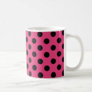 Zwarte haarvlekken op fuchsia koffiemok