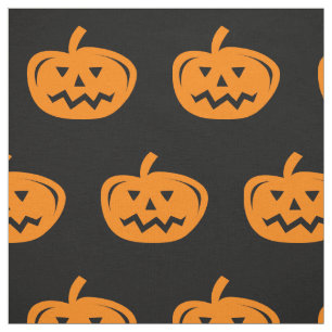 Zwarte Halloween stof met gesneden oranje pompoene