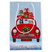 zwarte herderhond in auto met kerstman medium cadeauzakje (Voorkant)