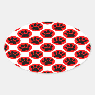 Zwarte honden in rode poka-stippen ovale sticker