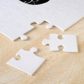 Zwarte hondenpootafdruk met witte krullen legpuzzel (Zijkant)