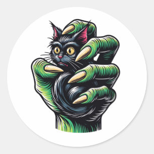 Zwarte kat gevangen door hekserige hand ronde sticker