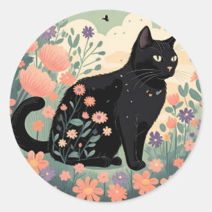 Zwarte kat illustratie in een veld van bloemen ronde sticker