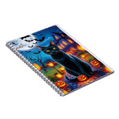 Zwarte kat in betoverd Halloween-landschap Notitieboek (Rechterzijde)