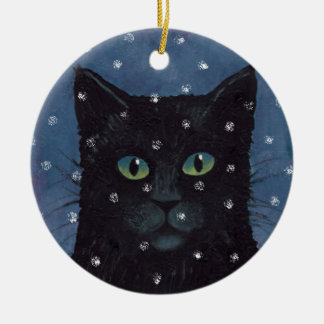 Zwarte kat in de sneeuwsierplant keramisch ornament