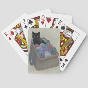Zwarte kat in garen zak pokerkaarten