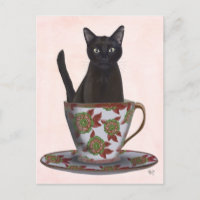 Zwarte kat in Teacup