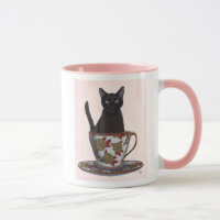 Zwarte kat in Teacup