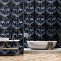 Zwarte kat met blauwe ogen