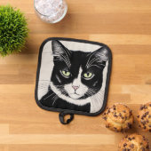 Zwarte kat met kattengrootte pannenlap (Top down)