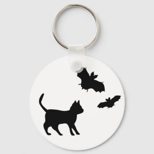 Zwarte kat met tas sleutelhanger