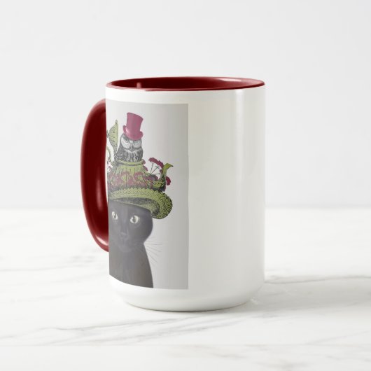 Zwarte kat met theepot en kippen mok (Voorkant links)