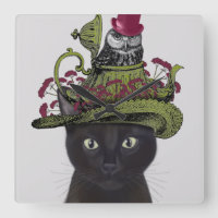 Zwarte kat met theepot en kippen