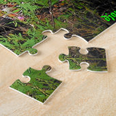 Zwarte kat op drijfhout legpuzzel (Zijkant)