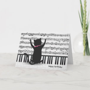 zwarte kat op pianolverjaardag kaart