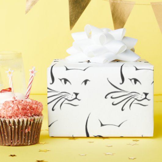 zwarte kat schetst wit cadeaupapier (Verjaardagsfeest)