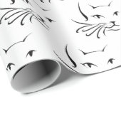 zwarte kat schetst wit cadeaupapier (Rol Hoek)