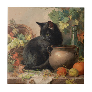 zwarte kat te midden van herfstvruchten tegeltje