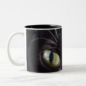 Zwarte kat, witte whiskers, groene ogen tweekleurige koffiemok (Links)