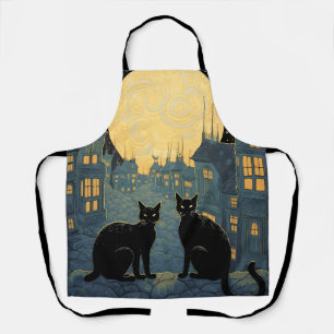 Zwarte katten op een dak schort