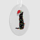 Zwarte kerstkat met lichte kerstmis ornament (voorkant)