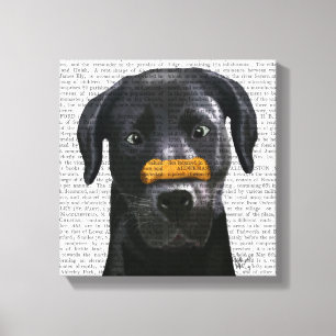 Zwarte labrador met bot op neus canvas afdruk