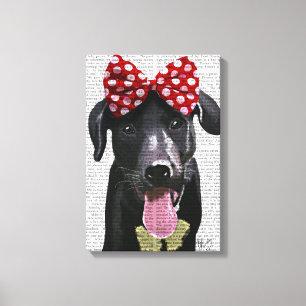 Zwarte labrador met rode bol aan kop canvas afdruk