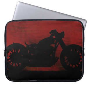 zwarte motor op rode rug laptop sleeve