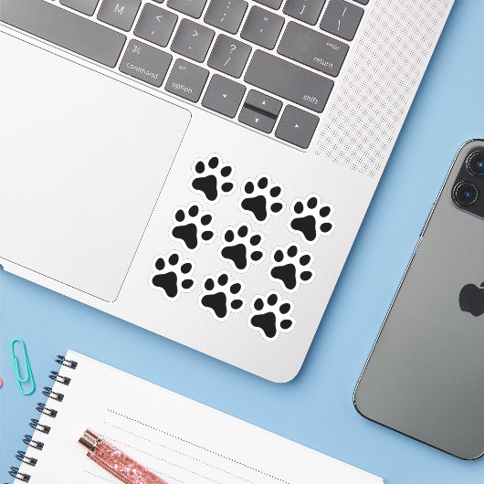 Zwarte paw print stickers, set van negen sticker (Laptop met iPhone)