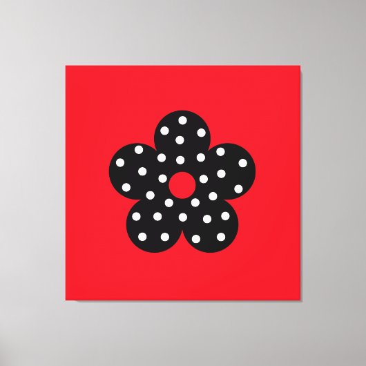 Zwarte polka dot bloem op rode achtergrond canvas afdruk (Voorkant)