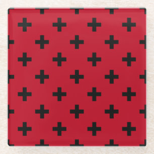 Zwarte polka kruist op rood glazen onderzetter