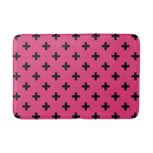 Zwarte polka kruist over fuchsia badmat